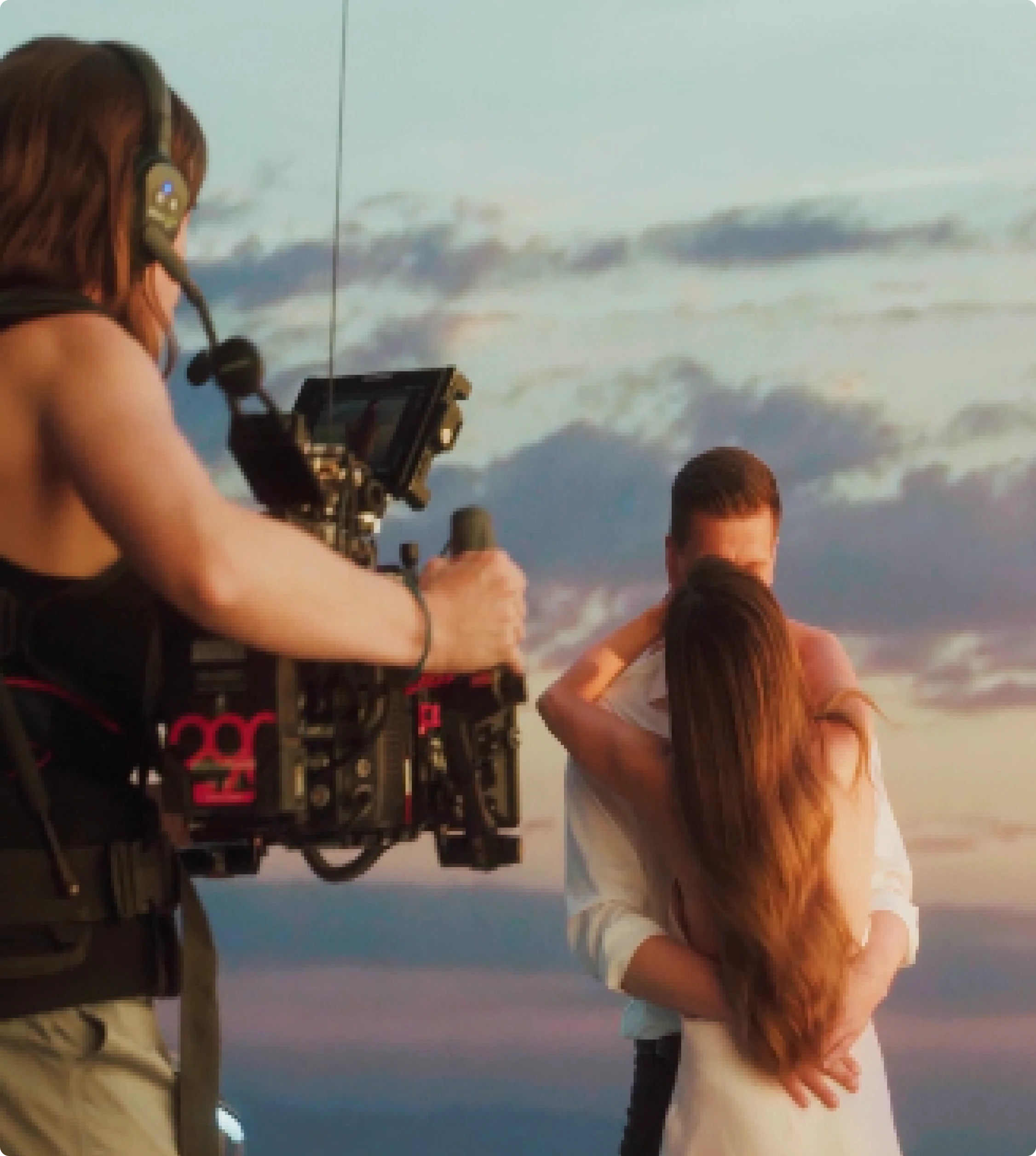 Two leads during a shoot with the city in the background, an example of PLAY's creative direction.